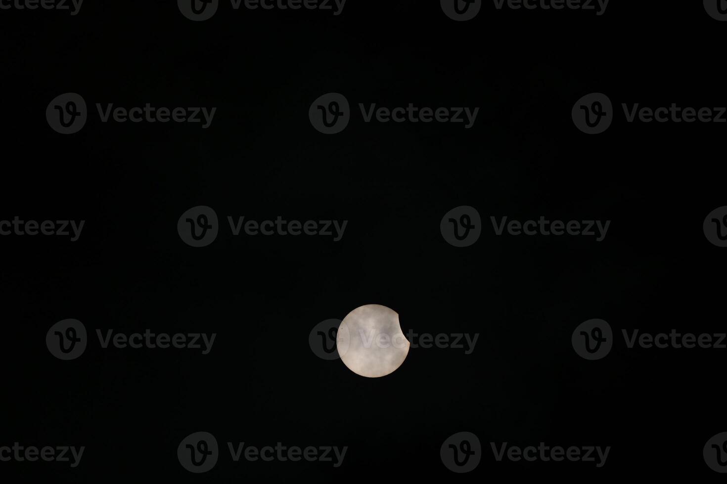 Partial Solar Eclipse in the Sky over Kollund DK in March 2025 photo