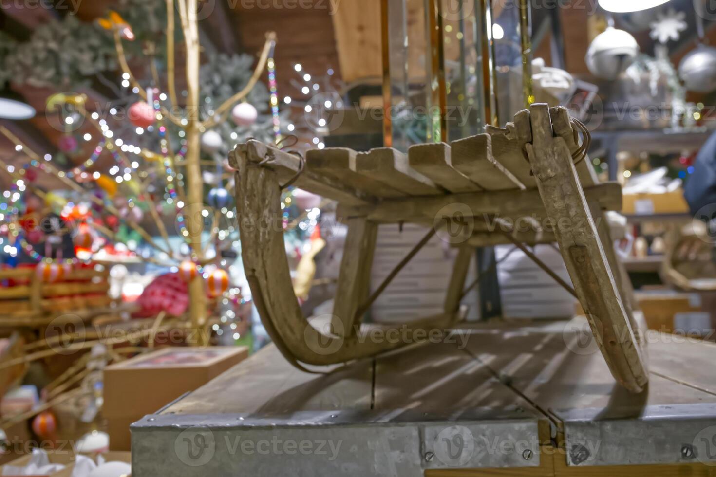 Vintage Wooden Sled in Festive Shop Setting photo