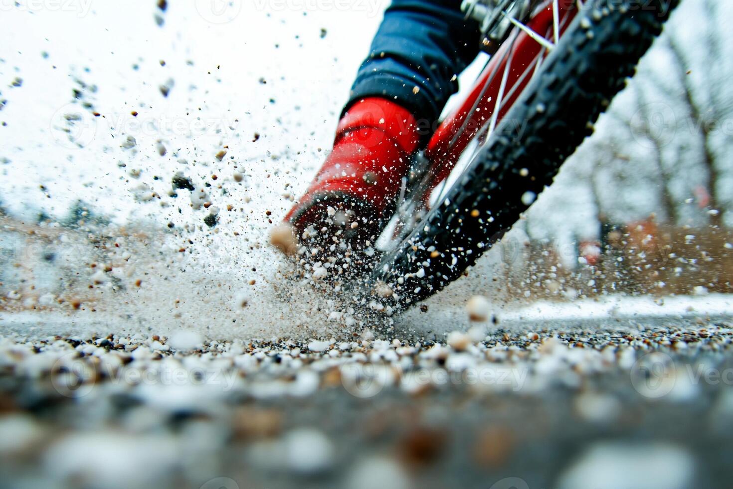 A person riding a bike in the snow photo