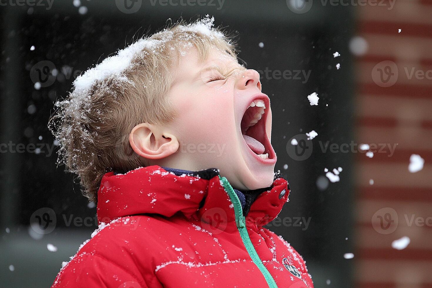 A boy is screaming in the snow photo