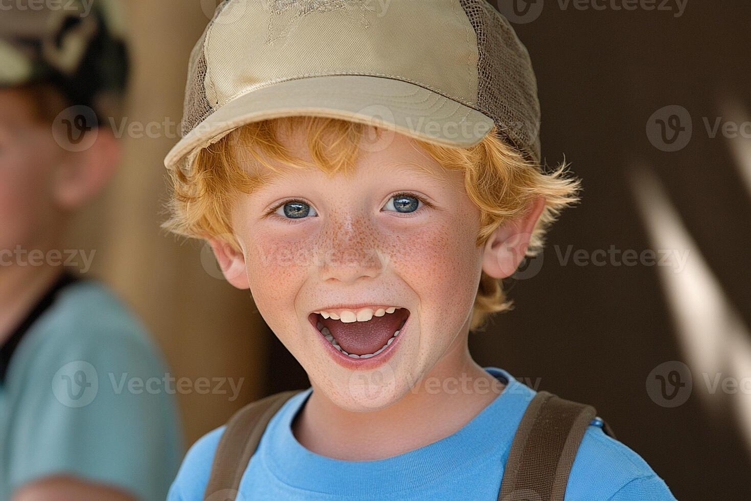 A young boy with a hat on photo