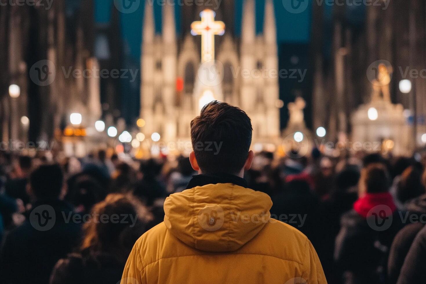 A man in a yellow jacket standing in front of a church photo