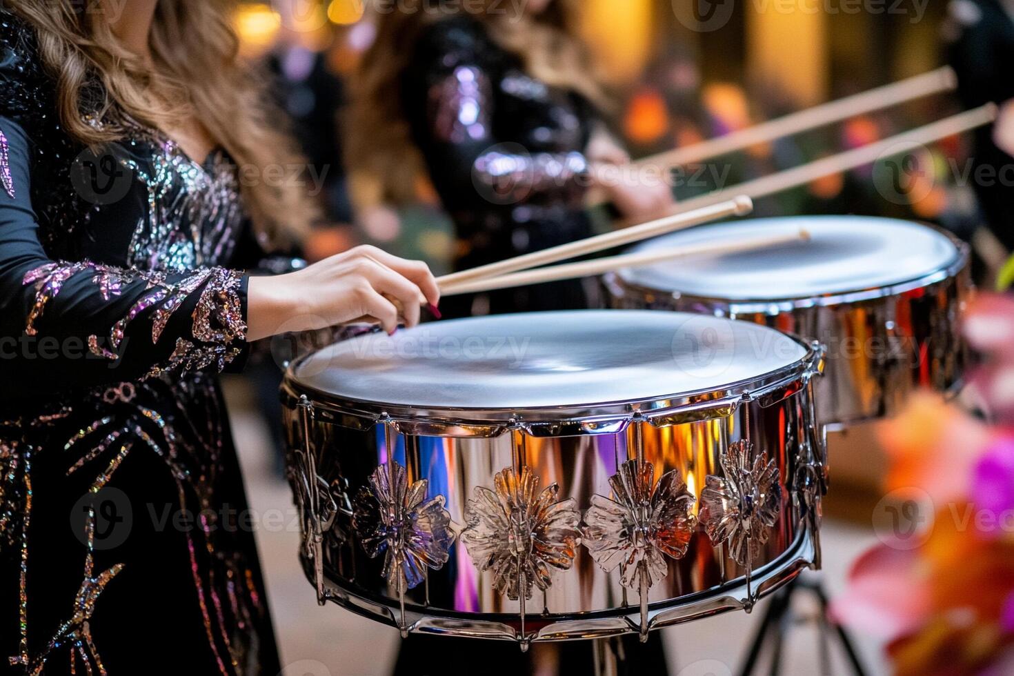 A group of women playing drums in a band photo