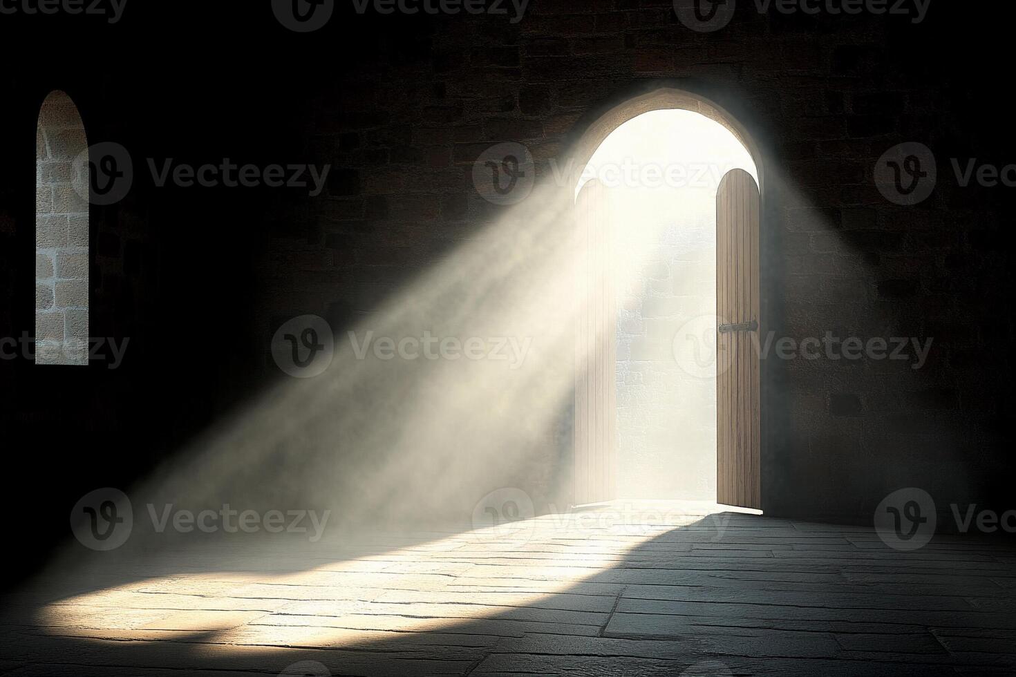 A light shines through a door in a dark room photo