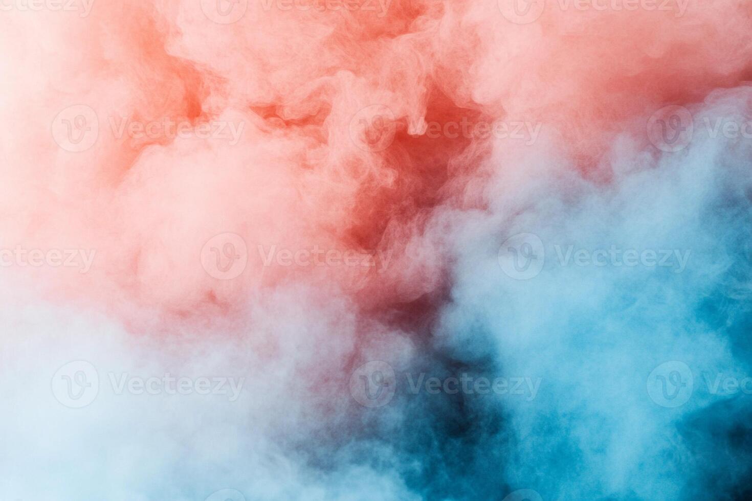 Colorful smoke on a black background photo