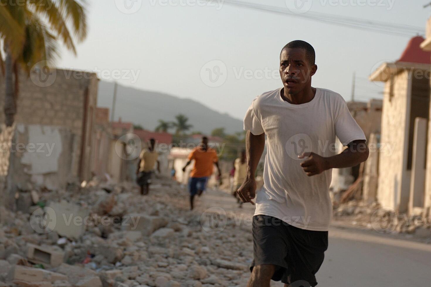 A man running in the middle of a street photo