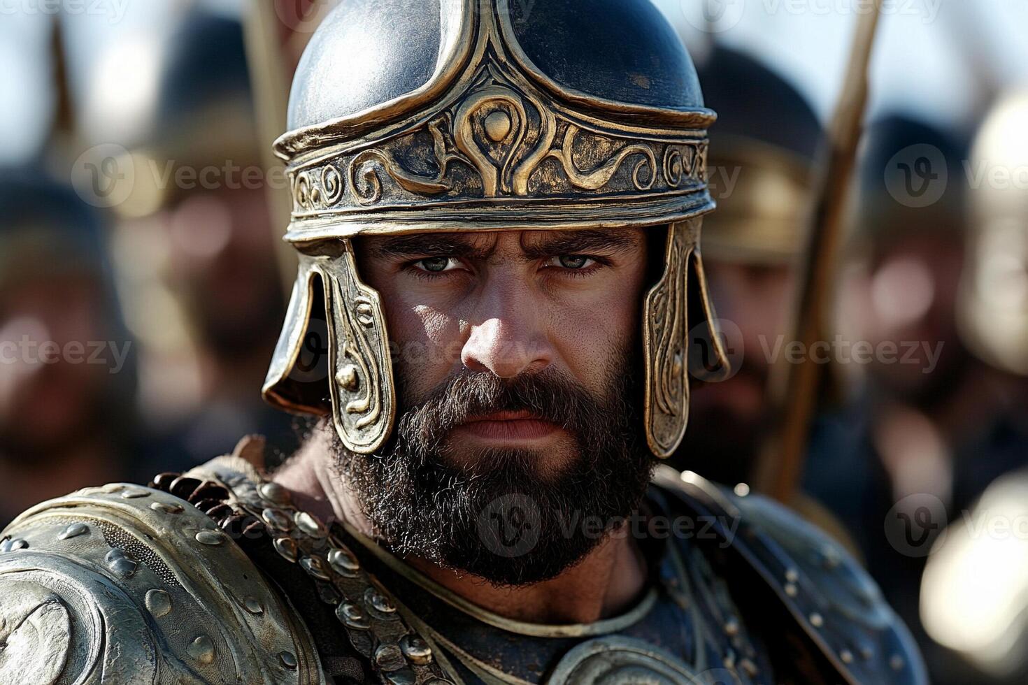 A man with a beard and helmet in a group of men photo