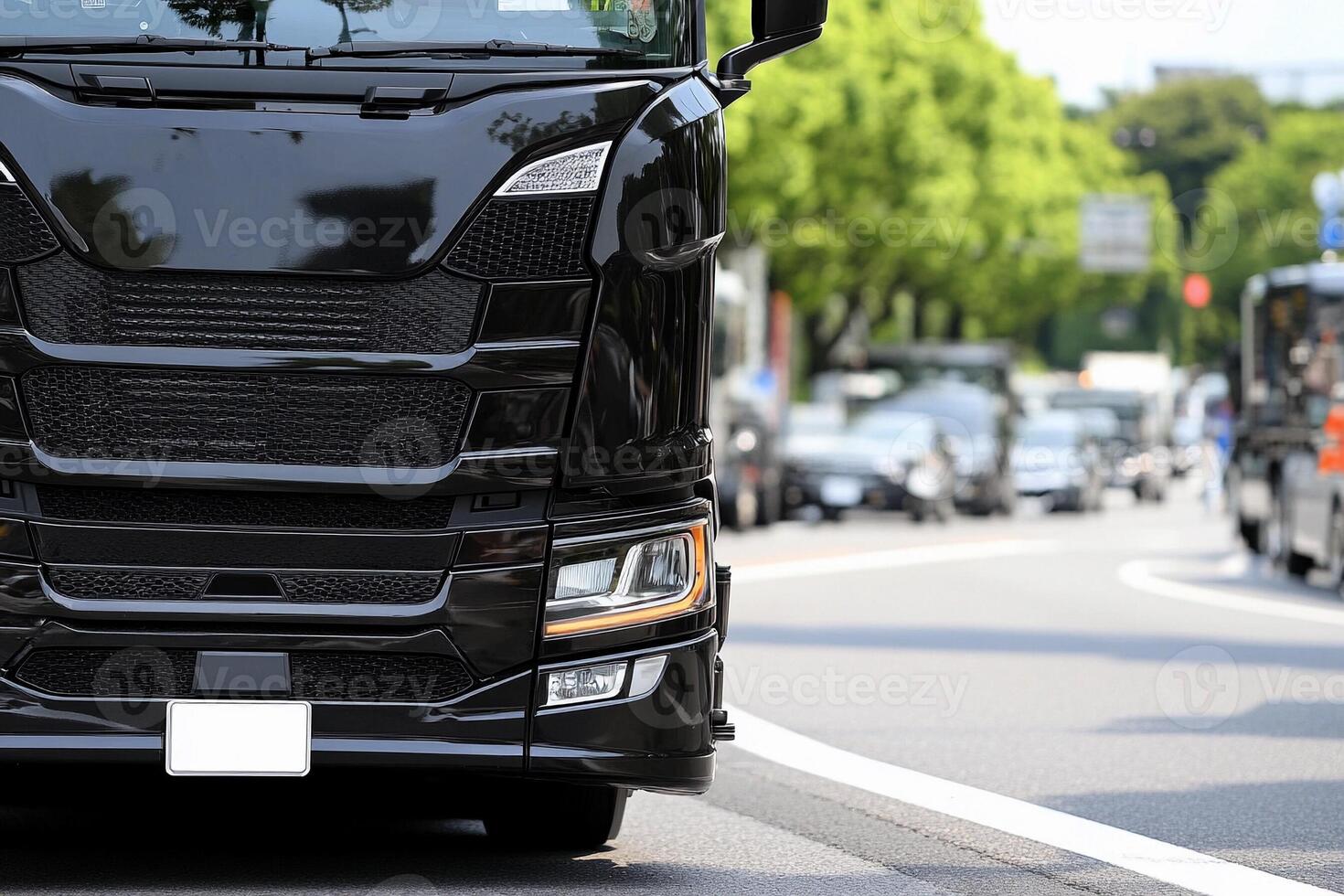 A close up of a black truck on a city street photo