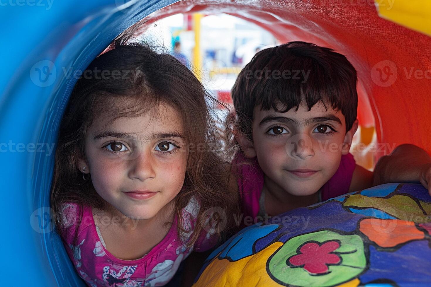 Two children are in a tunnel photo