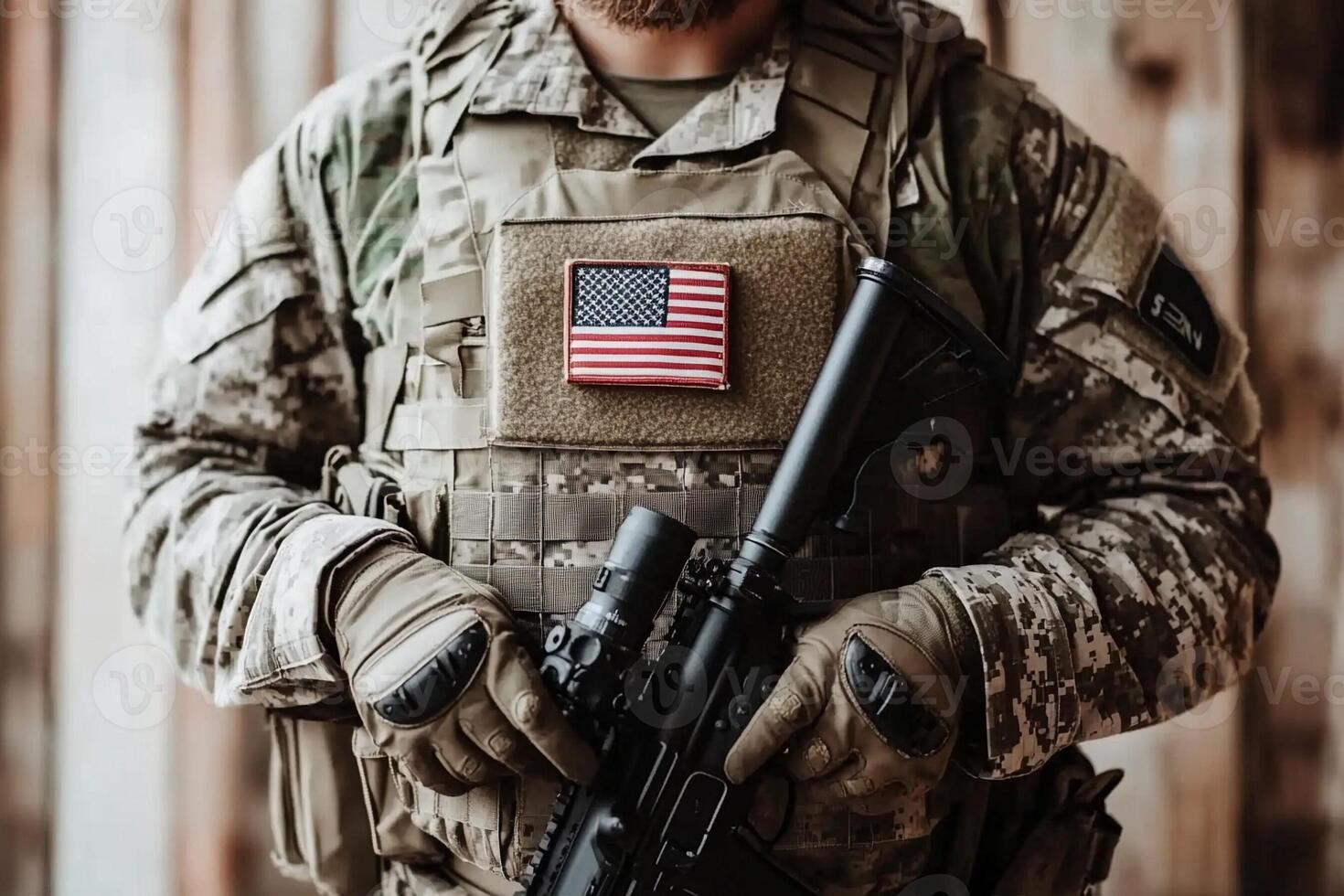 A soldier with an american flag on his chest photo