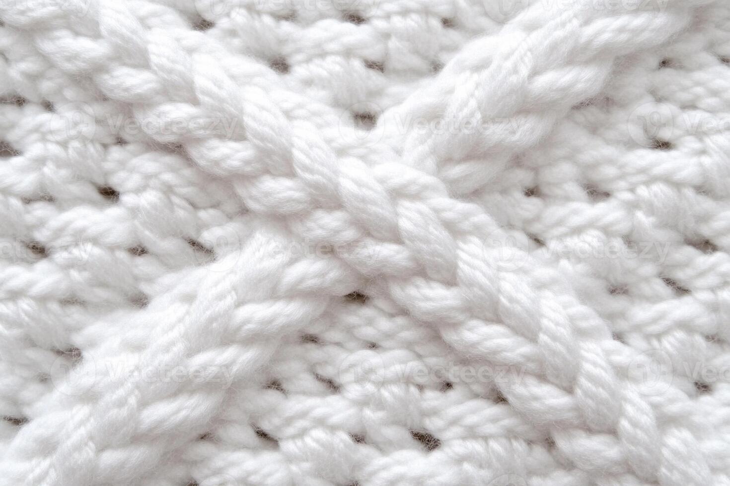 A close up of a white knitted scarf photo