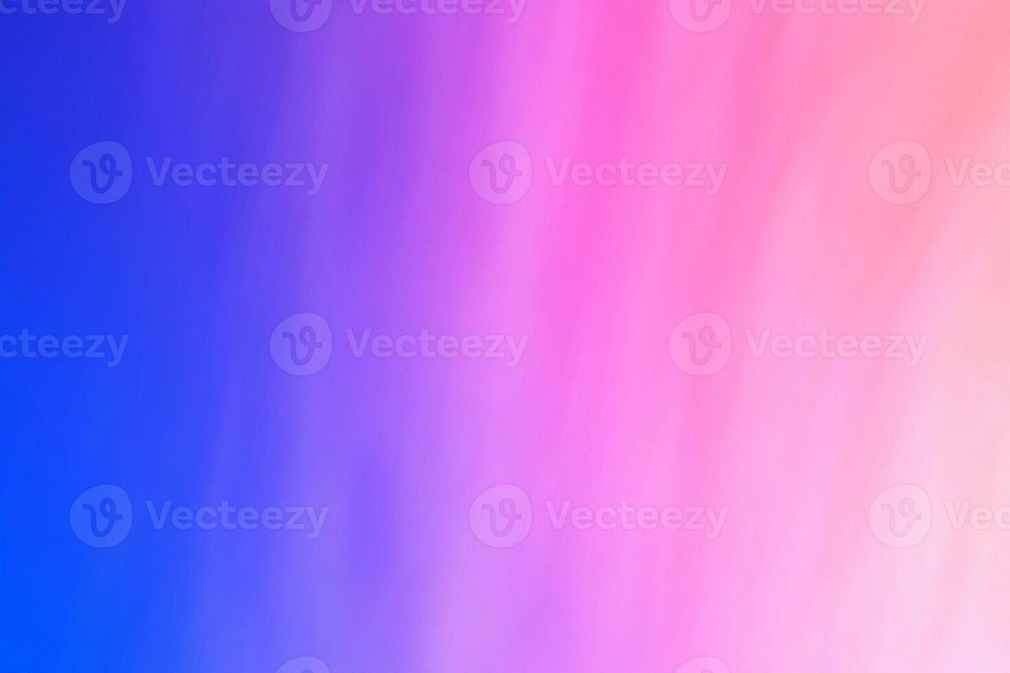 A pink and blue background with a blurred effect photo