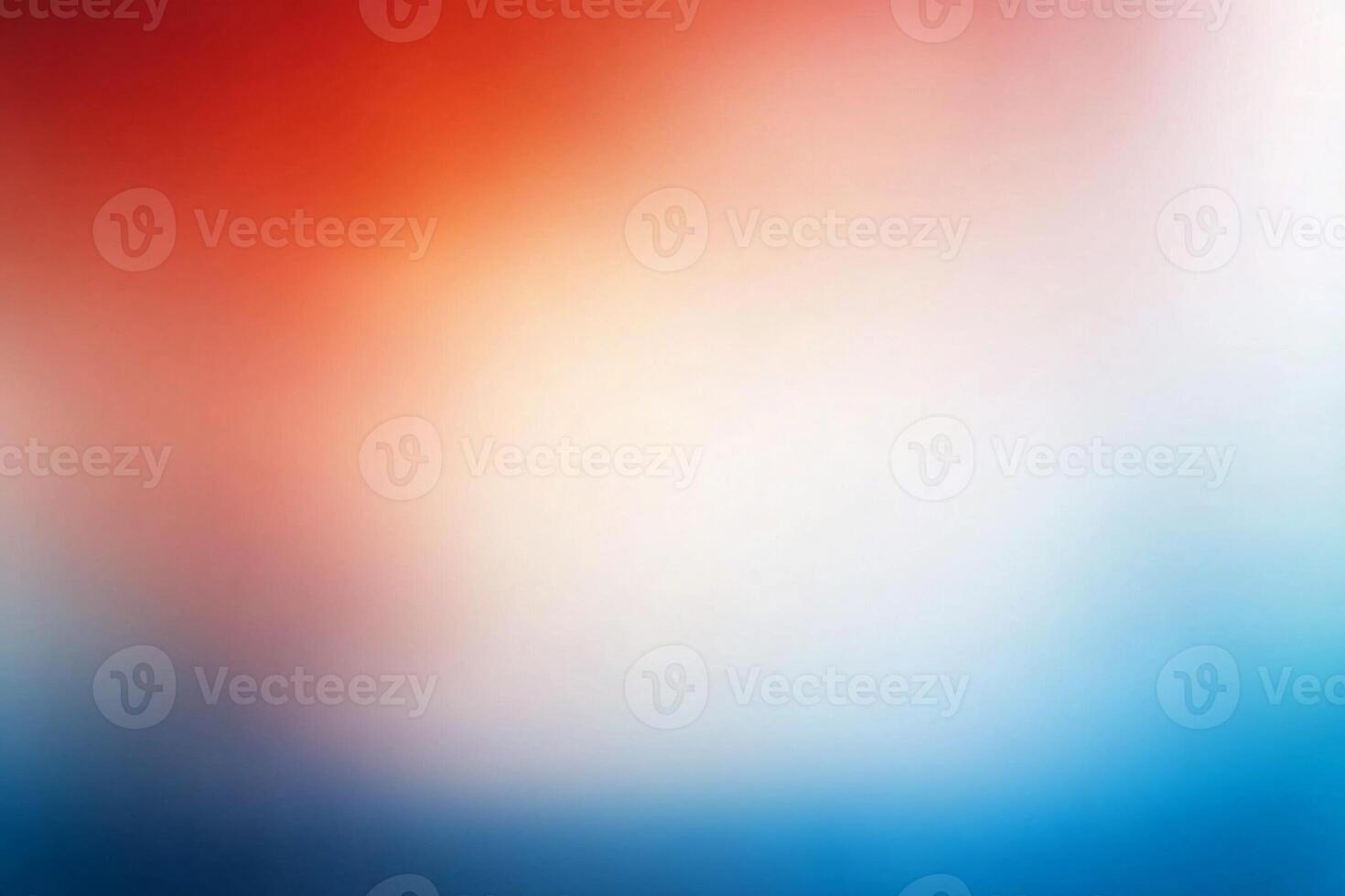 A blurry background with red, blue and white colors photo