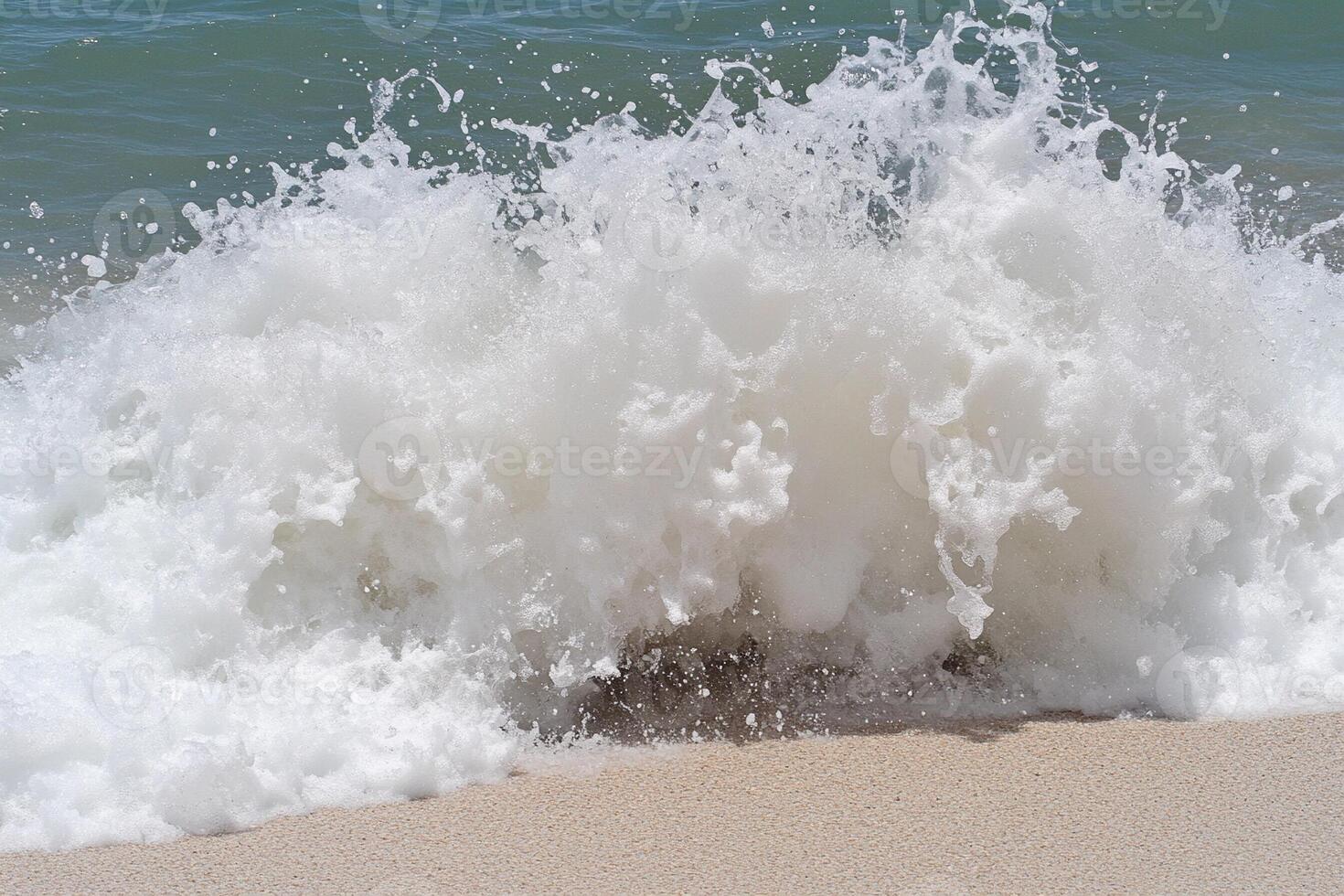 A person on a surfboard riding a wave photo