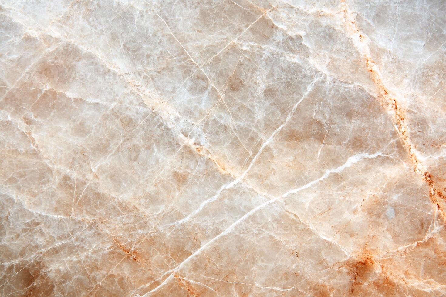 A close up of a marble surface with white and brown photo
