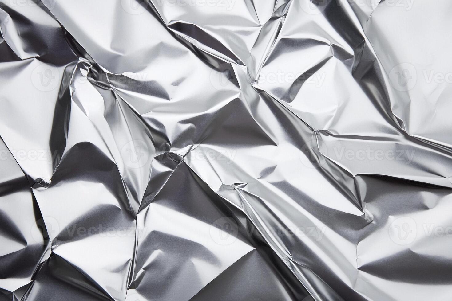 A close up of a sheet of silver foil photo