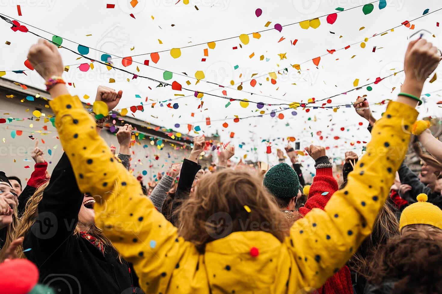 People celebrating at a party with confetti photo