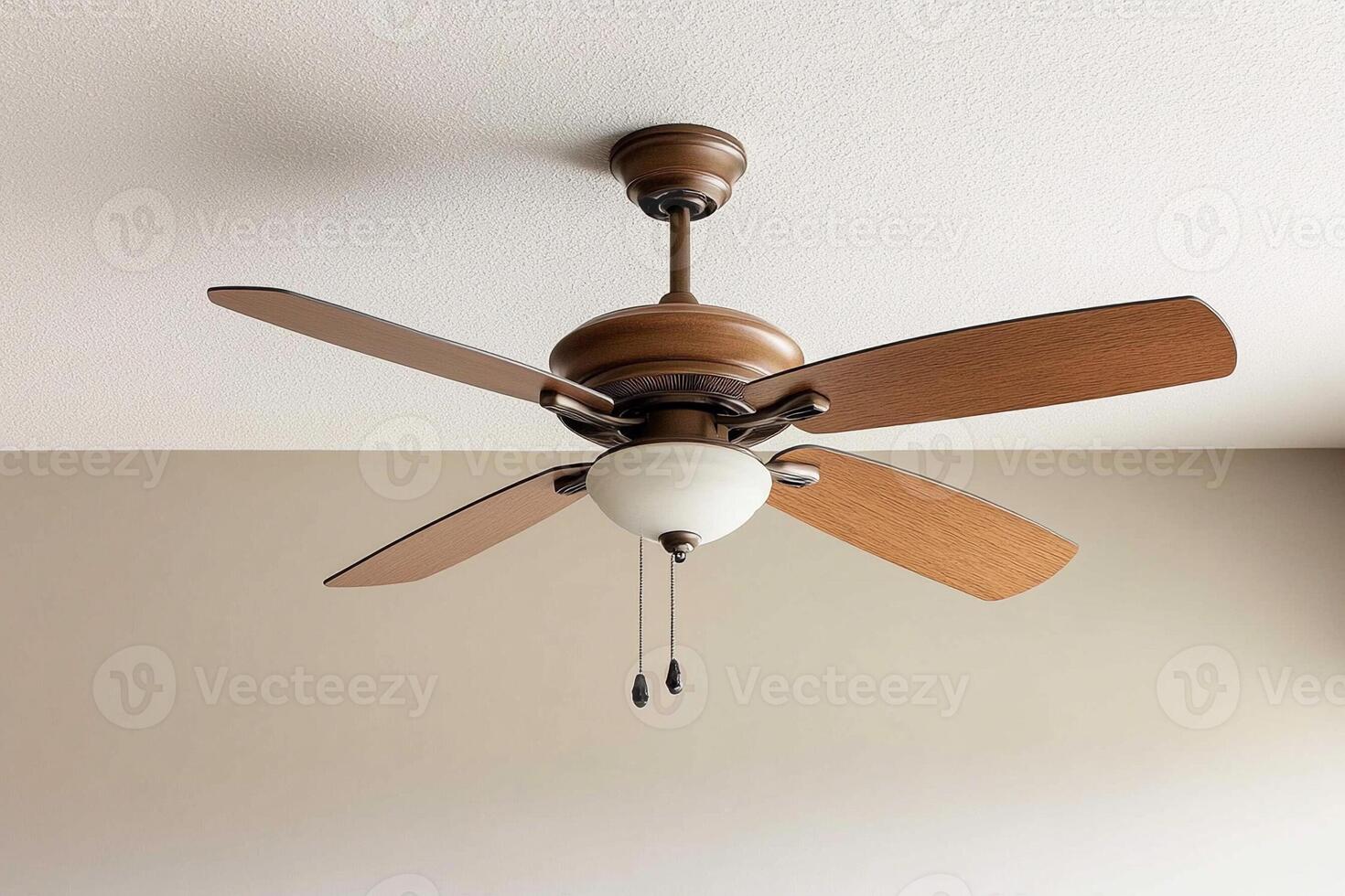 A ceiling fan with two blades and a light photo