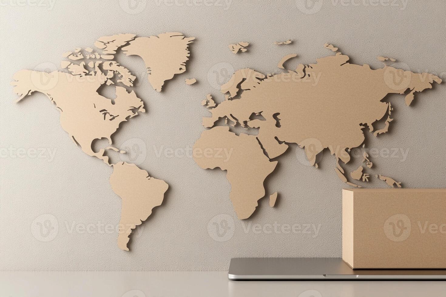 World map on a laptop with a cardboard box on the table photo