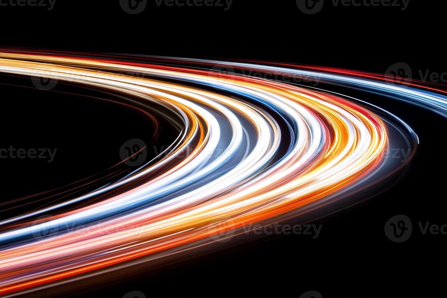 Light trails of a car passing by on a black background photo