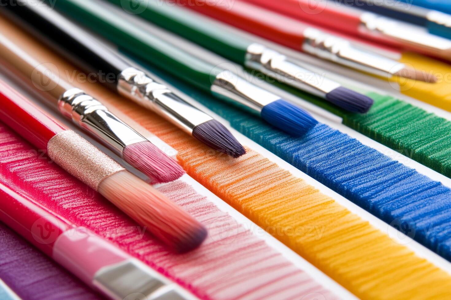 A close up of many different colored paint brushes photo