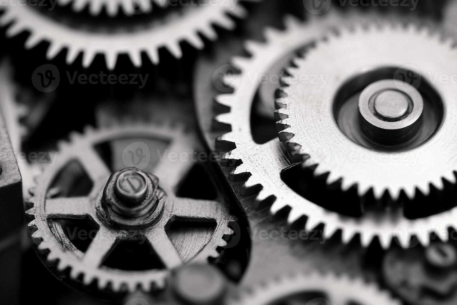 Black and white photo of gears in a clock