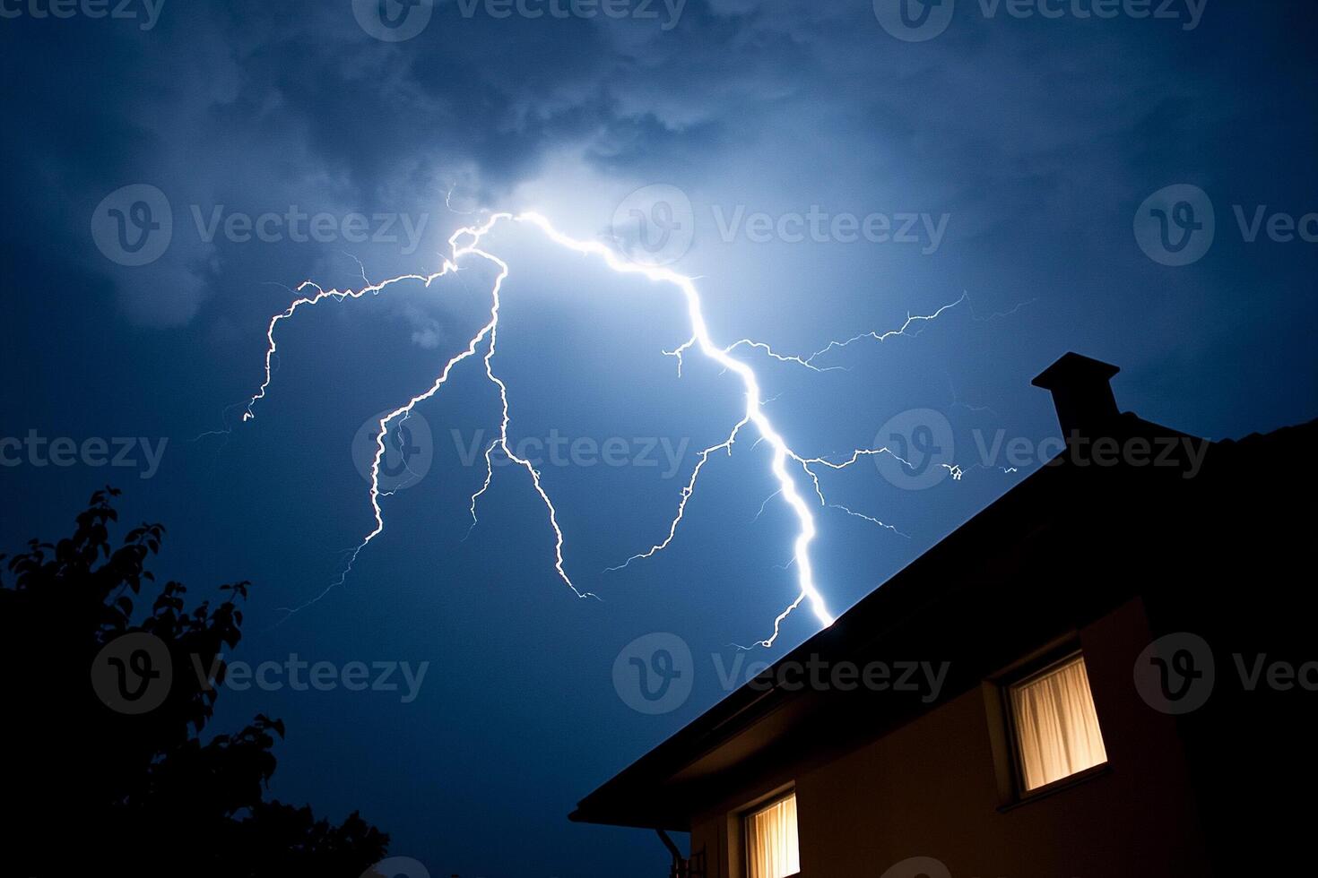 A lightning bolt is seen over a house photo