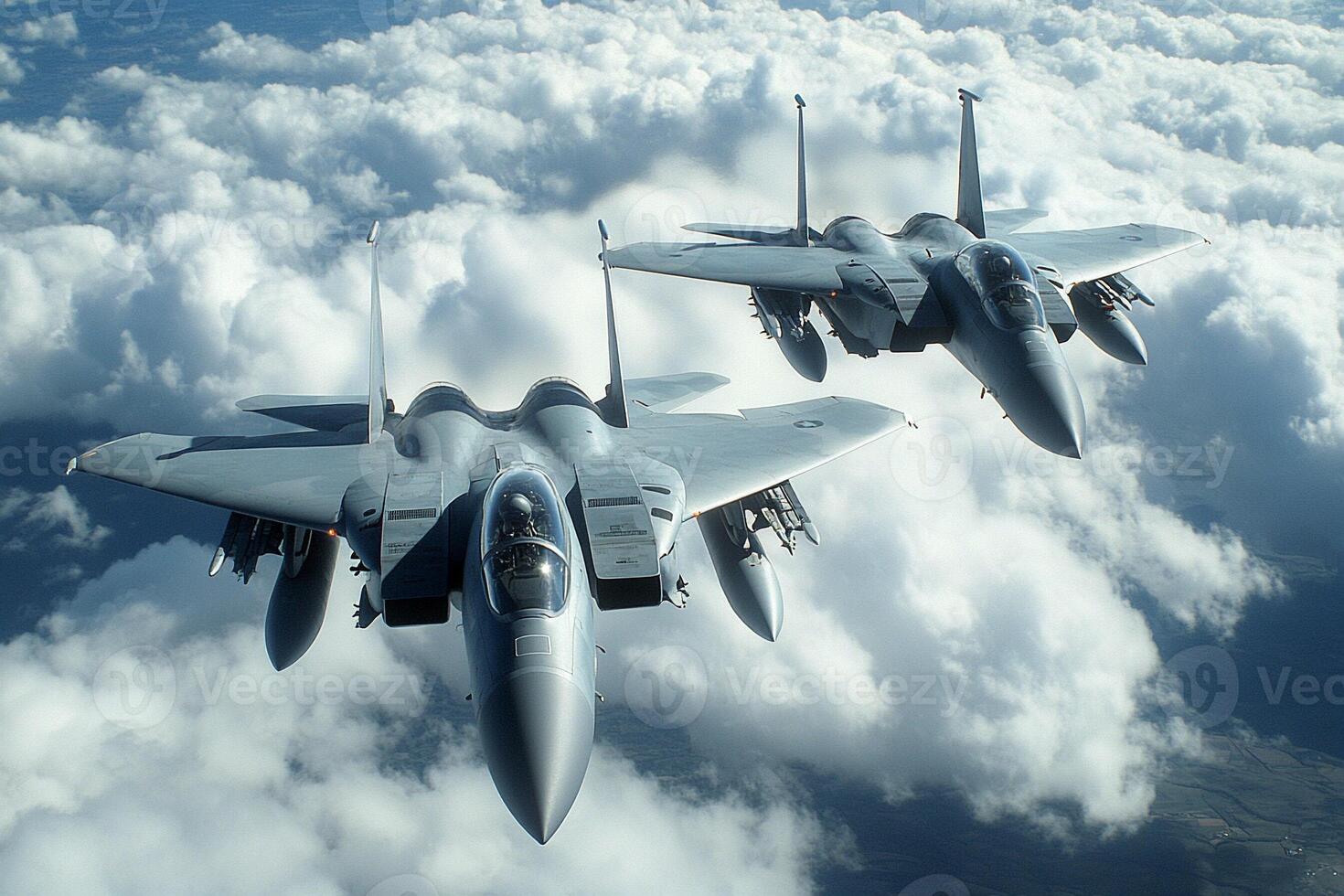 Two fighter jets flying in the sky photo