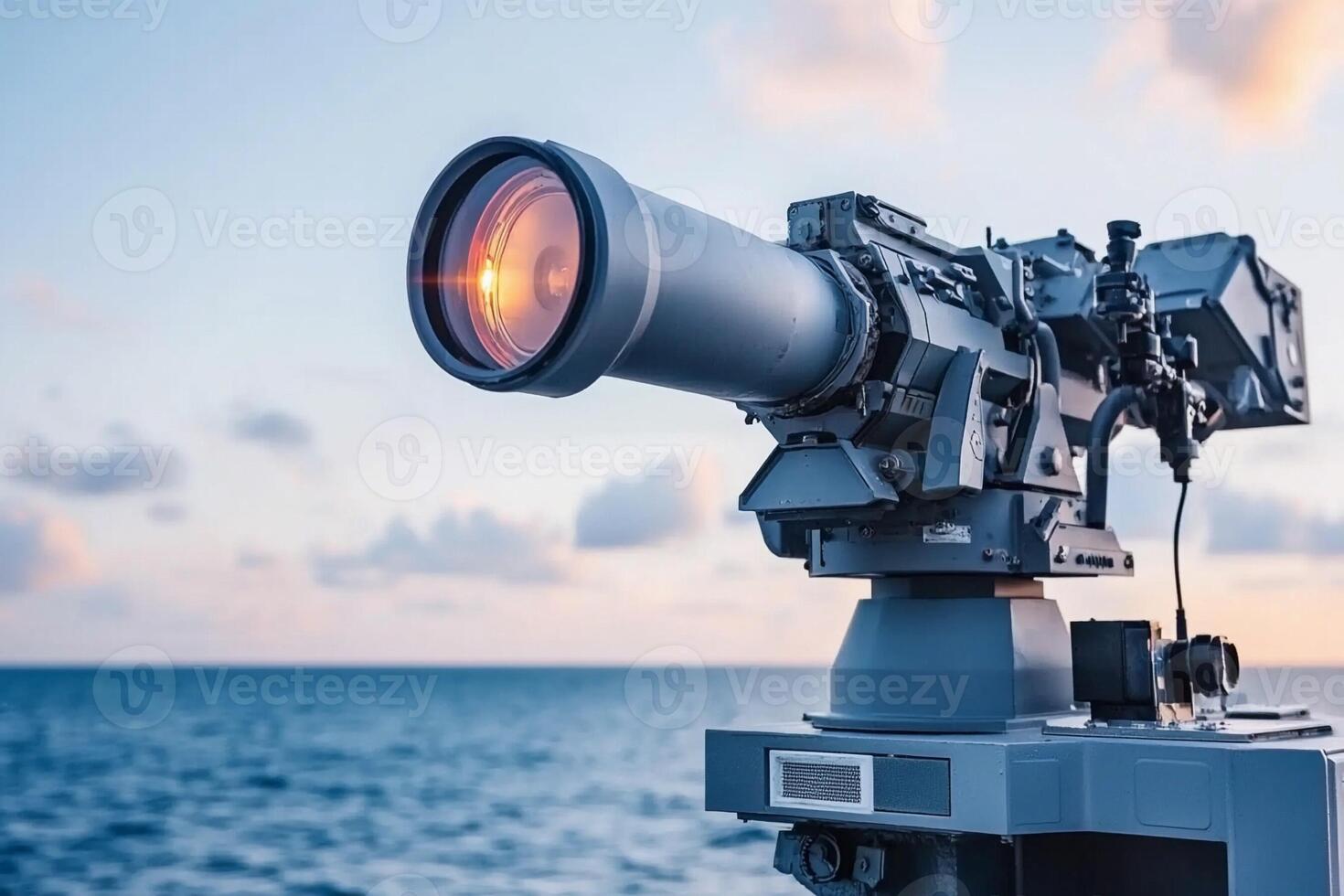 A large telescope on the deck of a ship photo