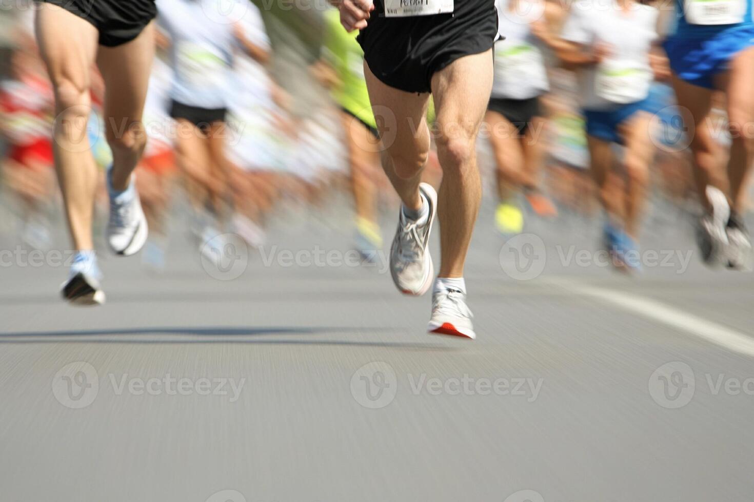 A group of runners are running in a marathon photo