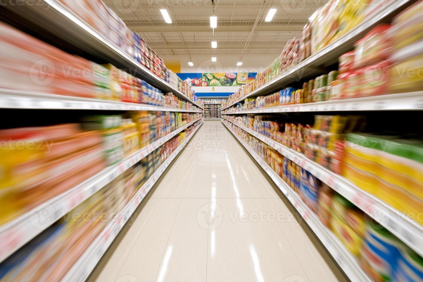A long aisle in a grocery store with motion blur photo