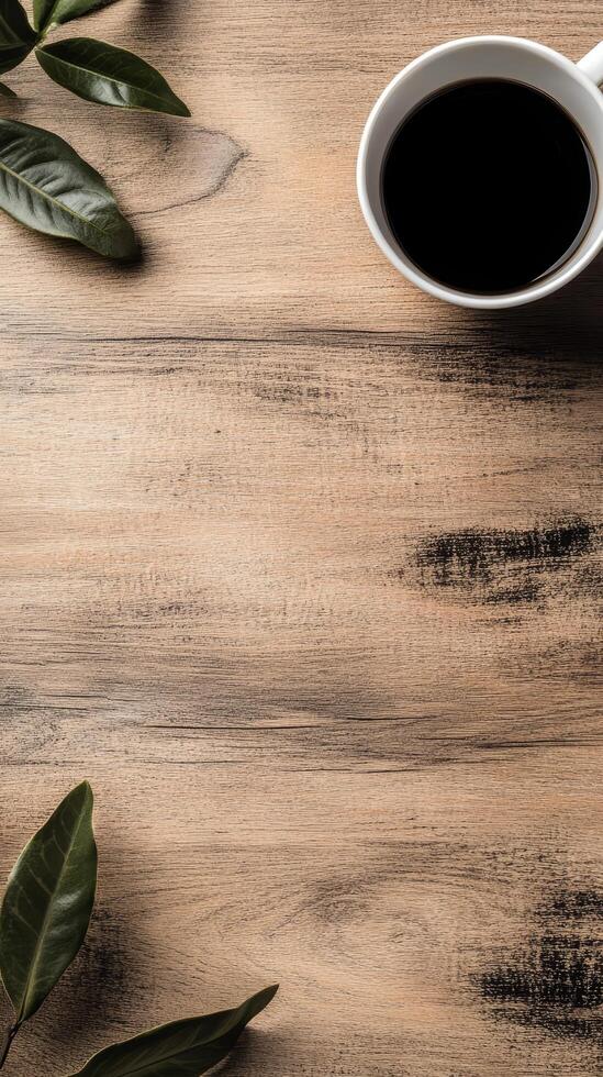 Aromatic Coffee Cup on Rustic Wood A Minimalist Flat Lay with Fresh Leaves, Perfect for Morning Still Life and Beverage Backgrounds with Empty Space photo