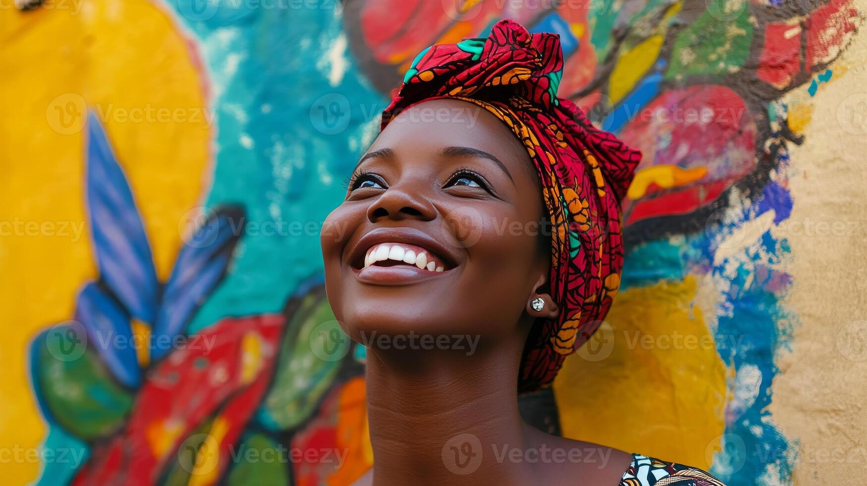 Radiant Woman in Vibrant Headwrap, Celebrating Joyful Expression photo