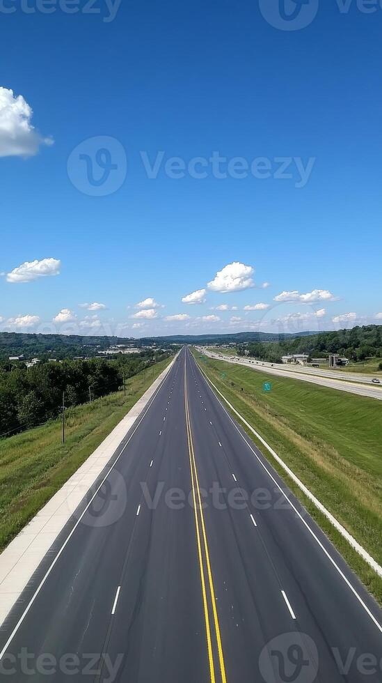 Highway stretching into the horizon, a scenic view of the open road. photo