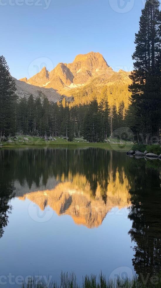 Serene Mountain Lake at Golden Hour photo