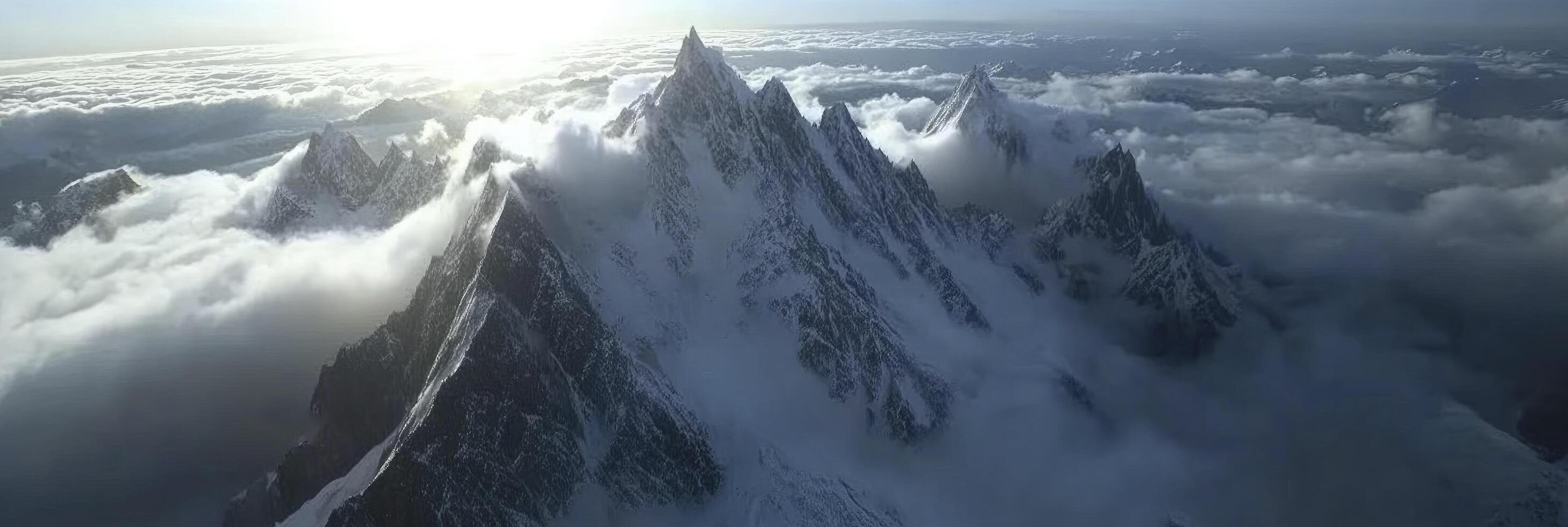 Aerial view of mountain range in the clouds photo