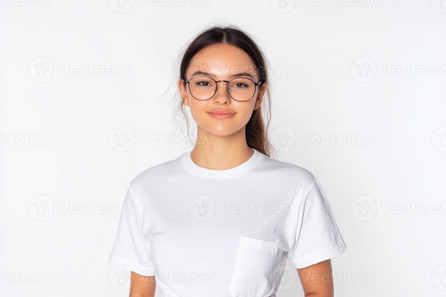 Portrait of a beautiful young woman wearing glasses and a white t-shirt photo