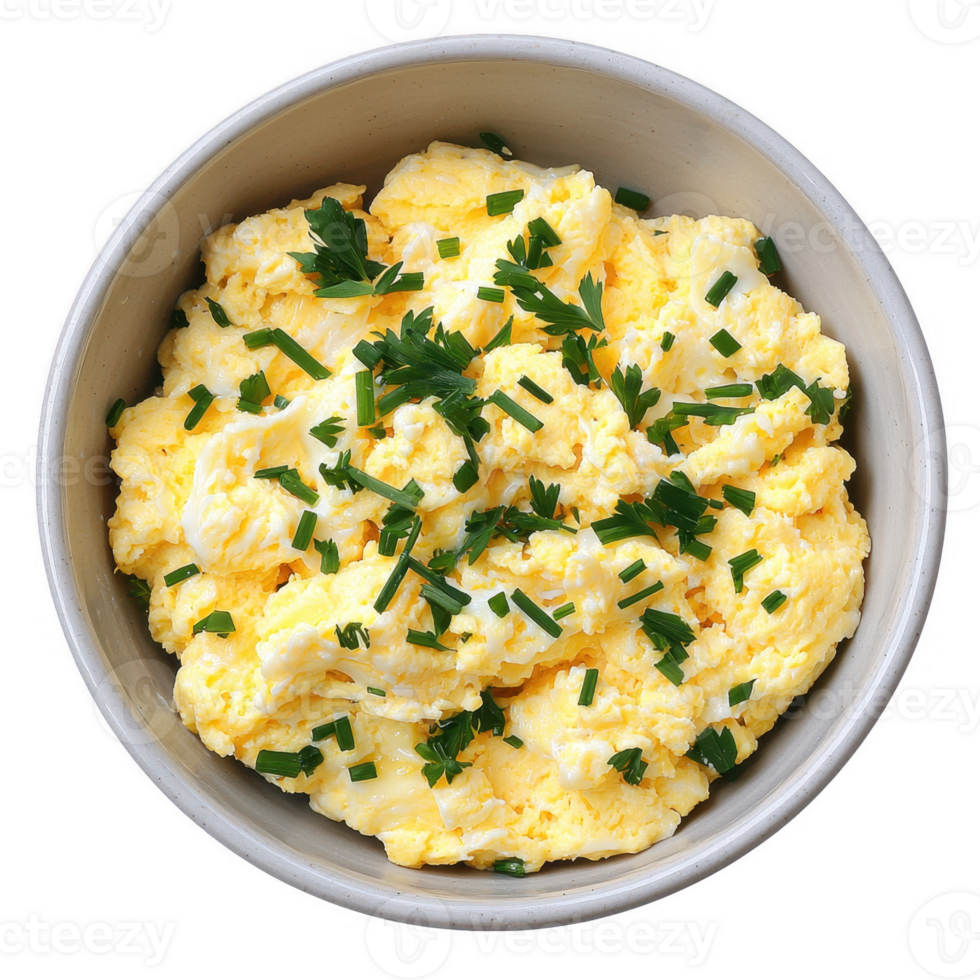 Creamy scrambled eggs topped with fresh chives in a bowl, perfect for breakfast or brunch. A delicious and healthy start to your day, ideal for sharing or meal preparation. png