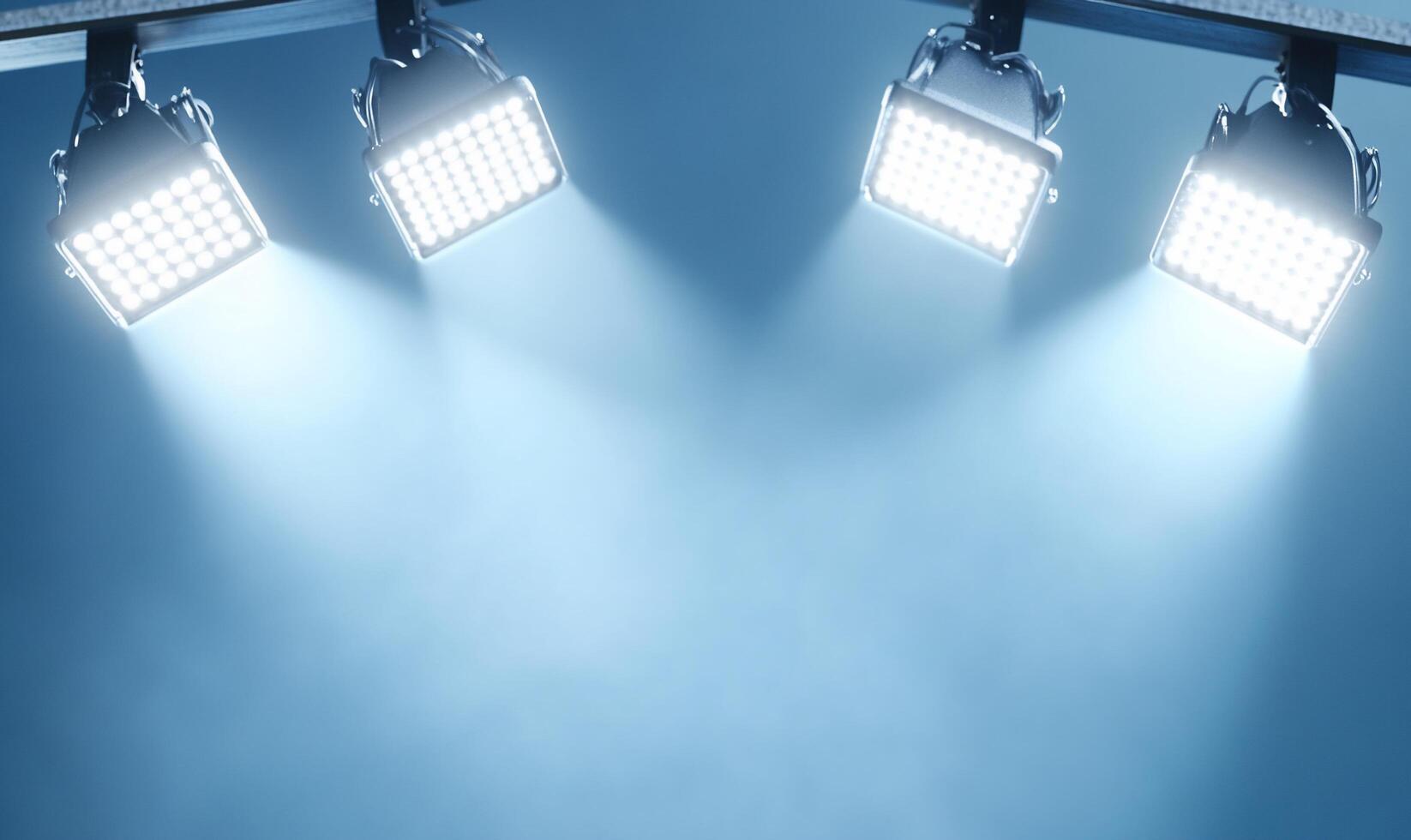 Three spotlights on a blue background photo