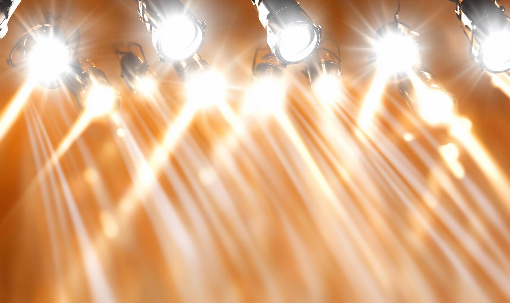 Bright stage lights illuminating a performance area with dramatic effect. photo