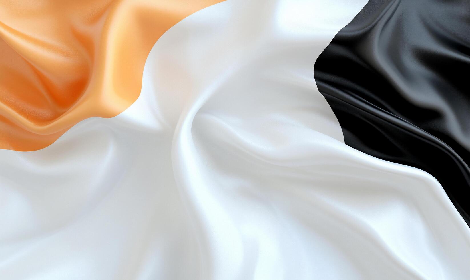A close-up of a wrinkled flag featuring orange, white, and black colors. photo