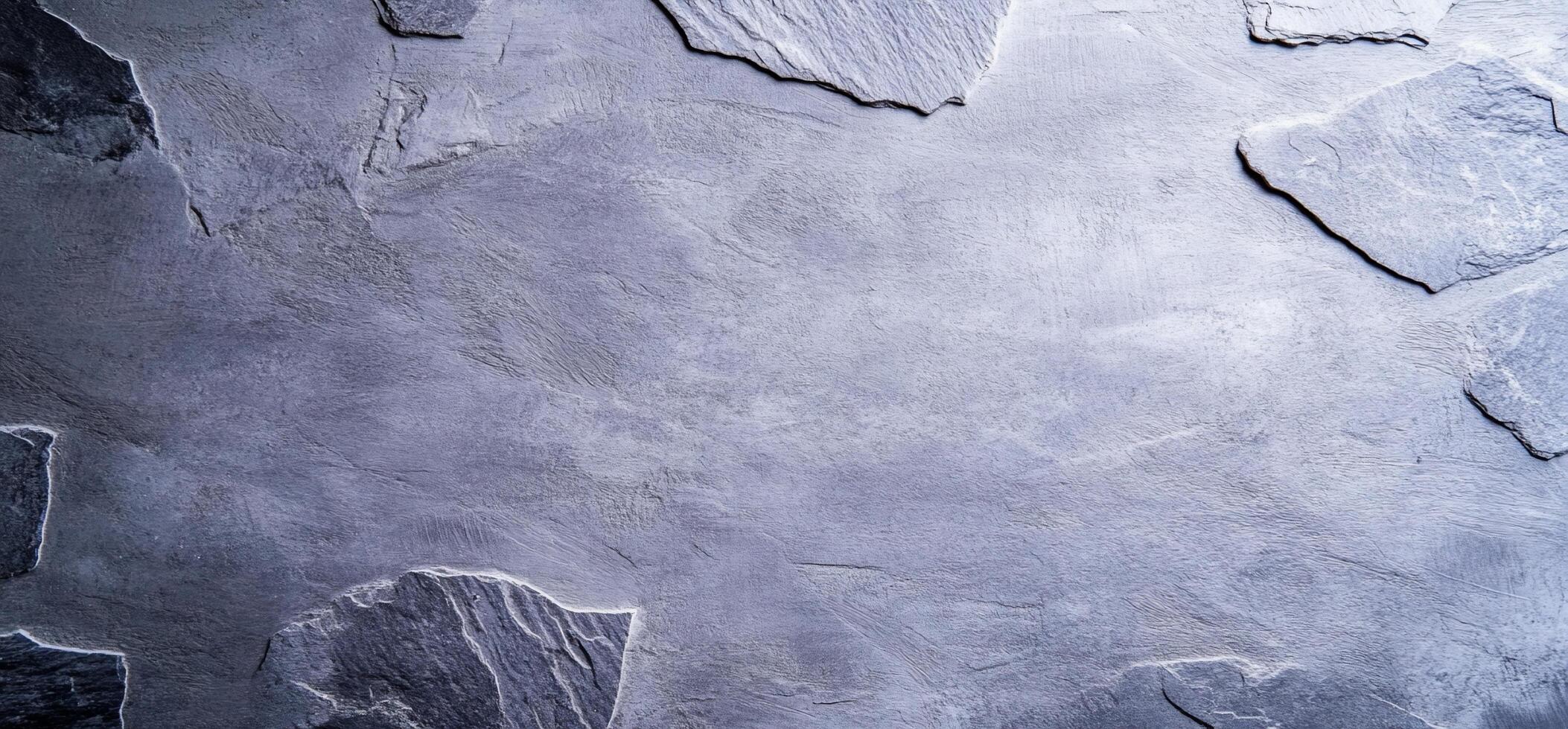 A textured surface of slate stones arranged in a natural pattern. photo