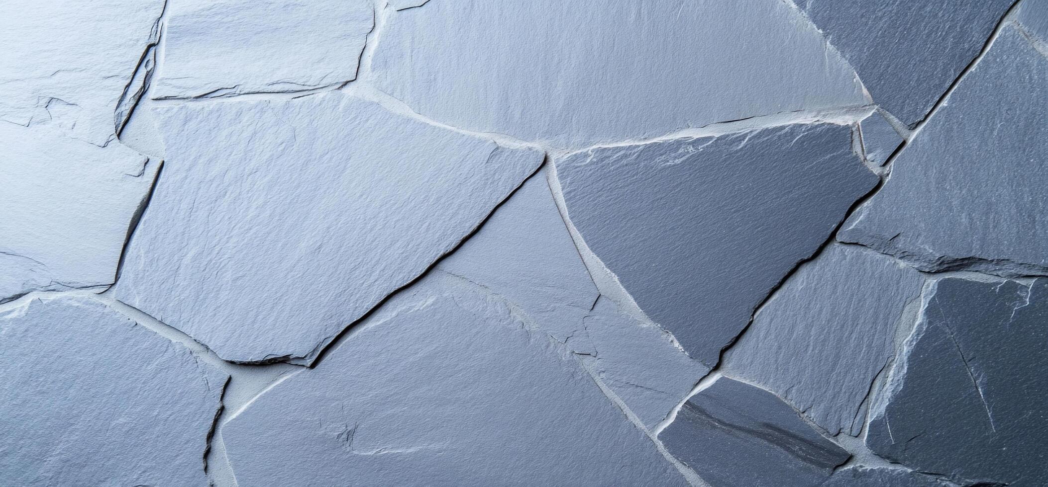 Close-up of textured slate stone surface, showcasing natural patterns. photo