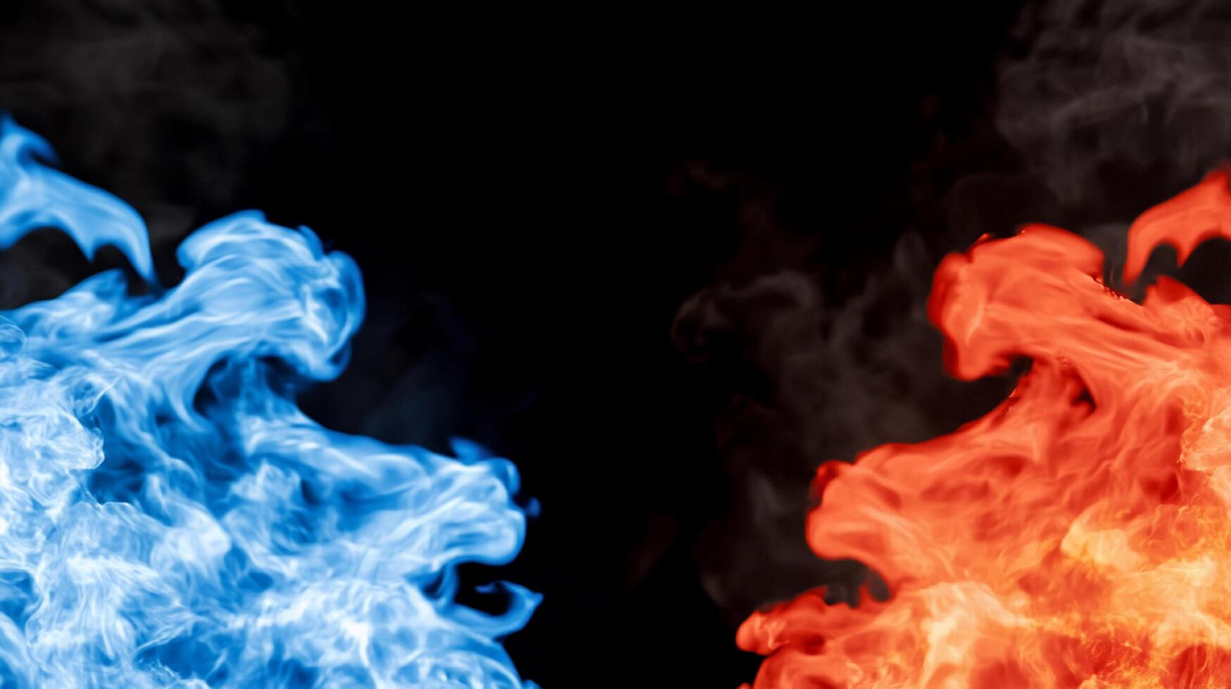 Blue and red flames contrasting against a black background. photo