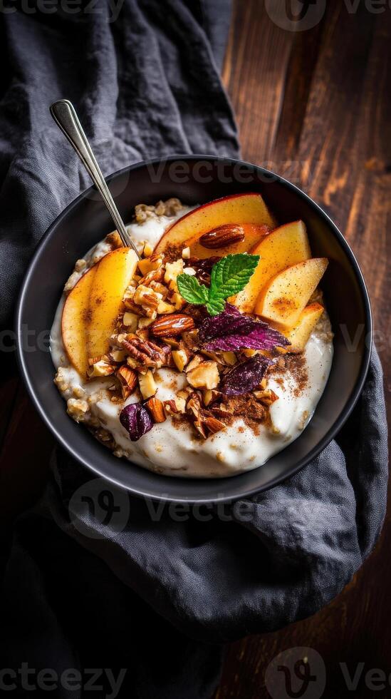 Delicious farm to table breakfast bowl with fresh fruit and nuts served in a rustic setting photo