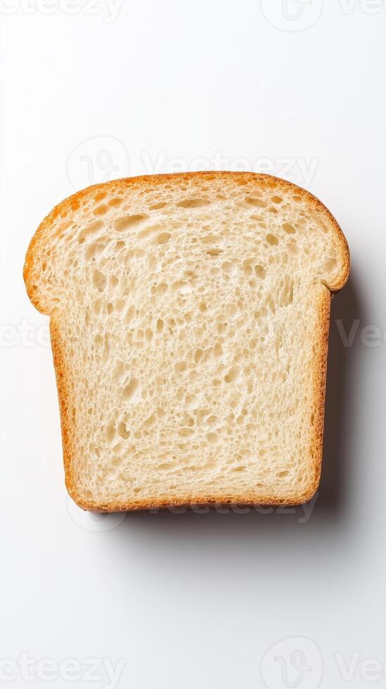 Freshly sliced white bread loaf on a clean backdrop showcasing soft texture and golden crust photo
