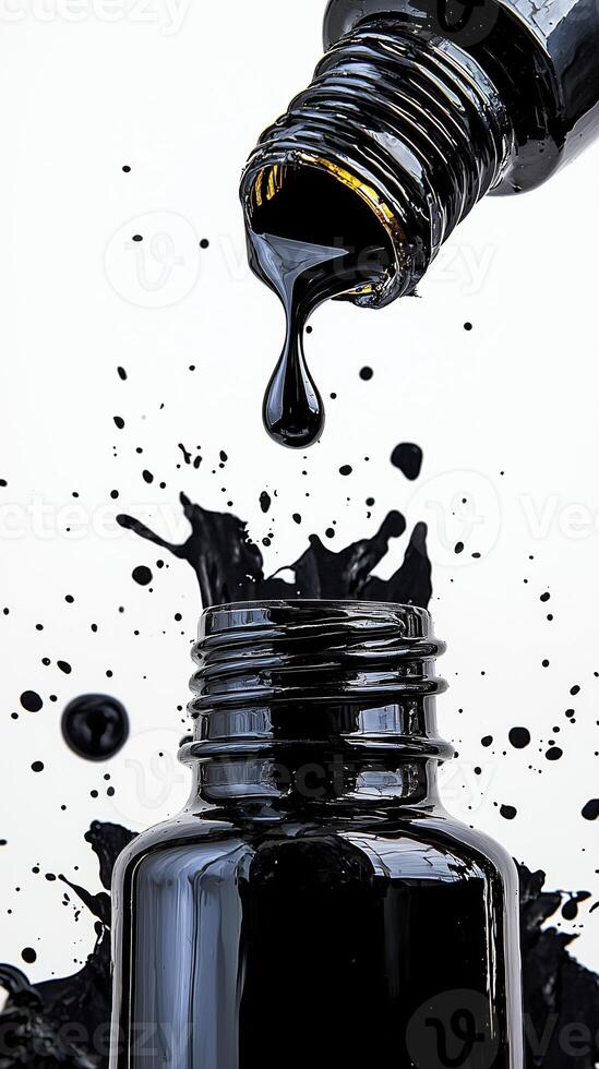 Black ink dropper bottle with splashing liquid on white background photo