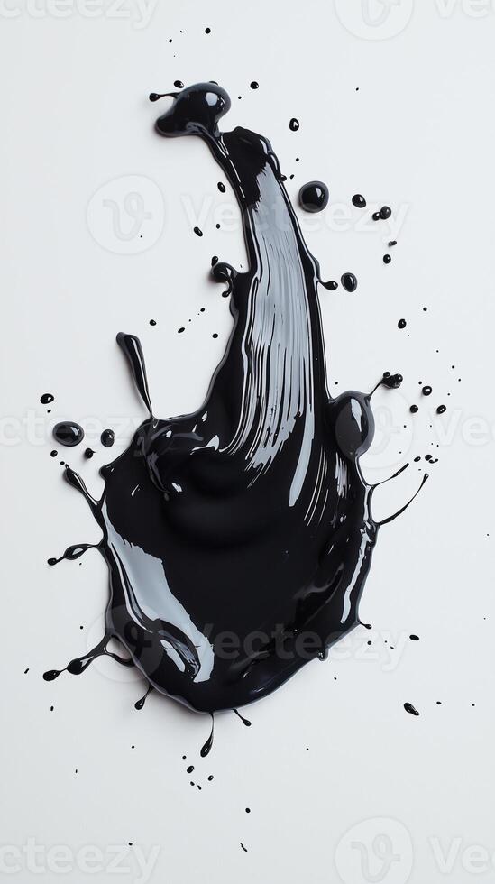 Splatters of black paint on white surface with glossy finish photo