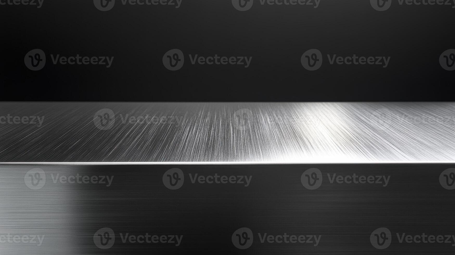 Sleek metallic surface with brushed texture in minimalist setting for modern design concepts photo
