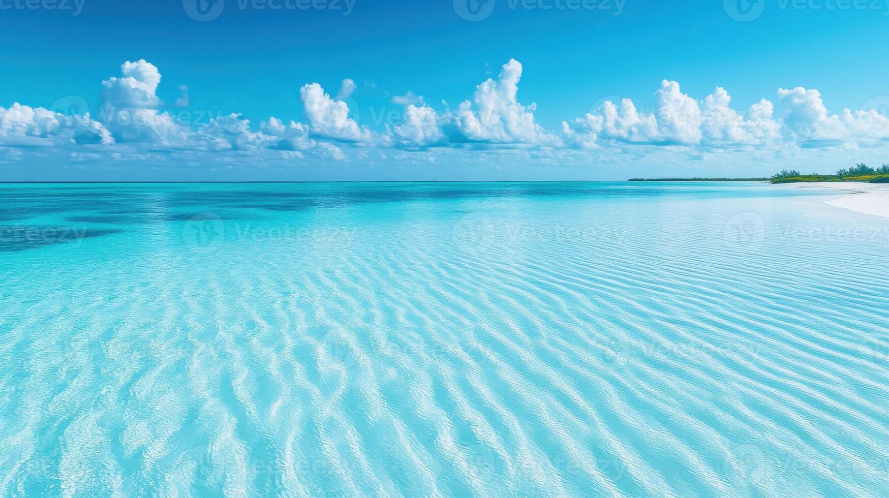 Tranquil turquoise ocean wave ripple surface under blue sky with cloud photo